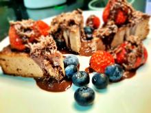 Nut and Millet Cake with fruit and hot chocolade sous